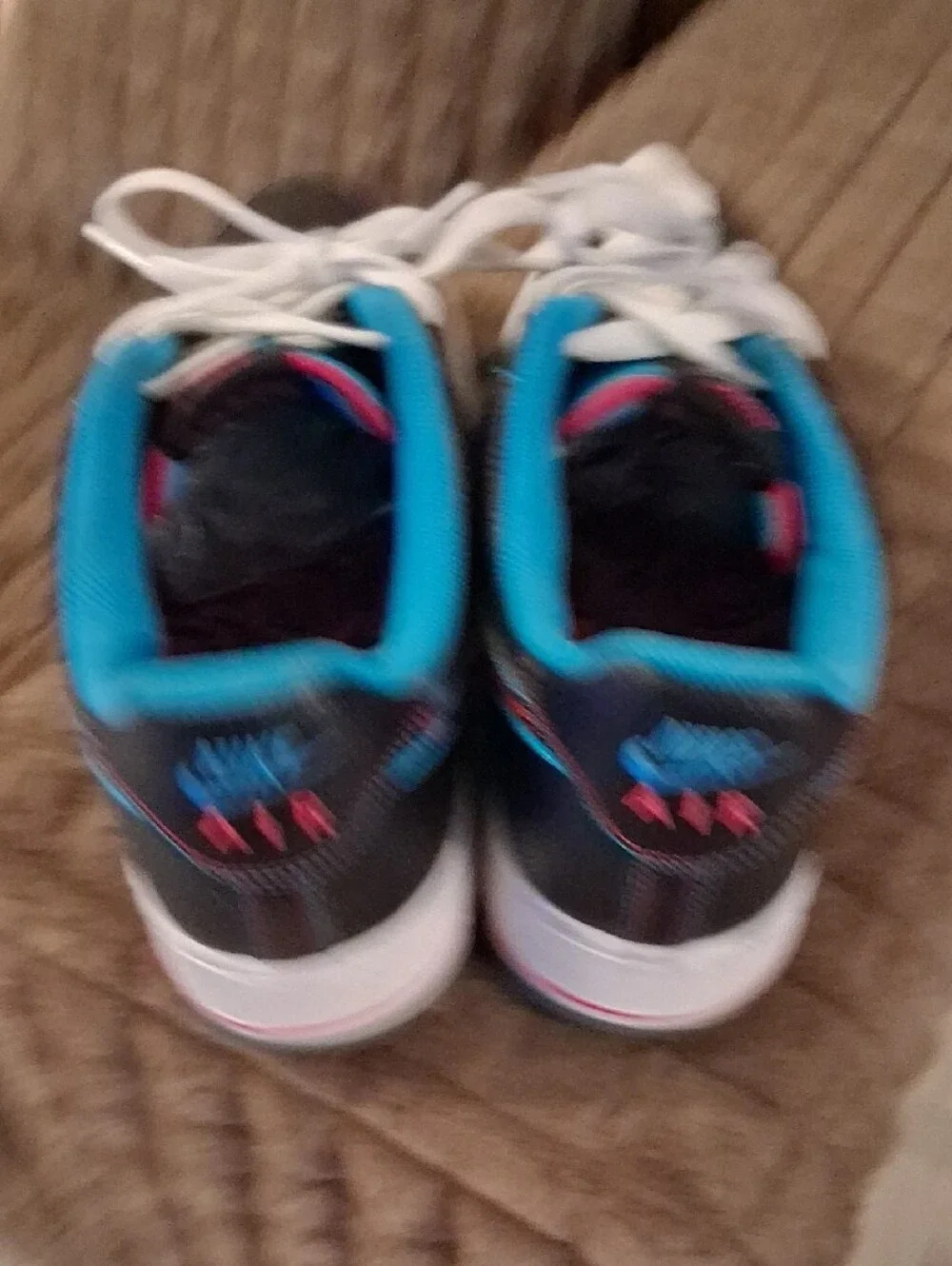 Nike Black Sneakers with Blue Lining and Red Patterned Swoosh